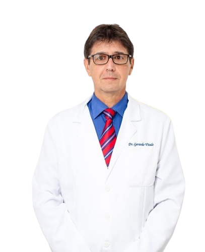 Inicio 6 imagen del Dr. Gerardo Vitale con bata de medico mirando hacia el frente